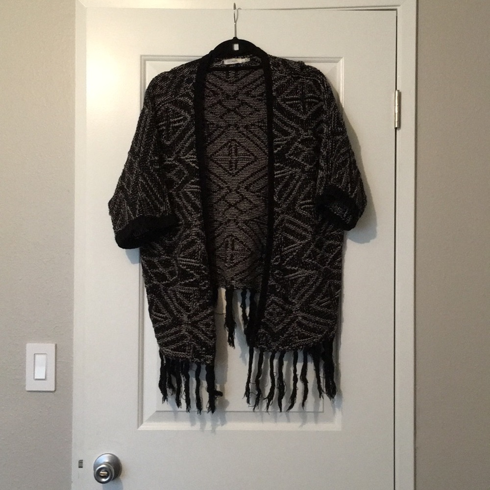 Blu pepper oversized knit fringed sweater